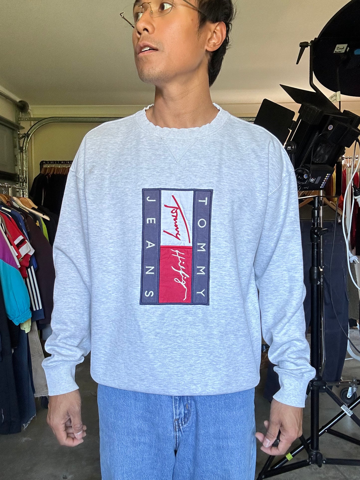 vintage-style Tommy Jeans crewneck sweatshirt features a prominent vertical logo patch on the chest Large