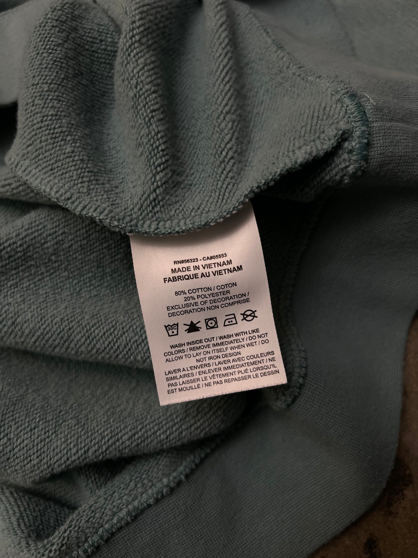 green Nike Men's Sportswear Club Fleece Crew features a classic embroidered logo on the chest Large