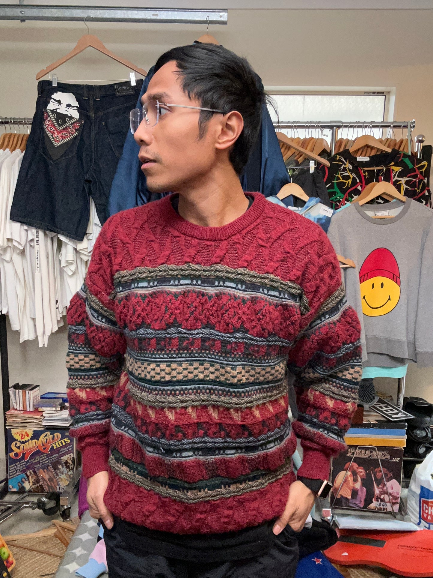 vintage Suave 3D knit sweater features a detailed geometric pattern in shades of red, black, and beige Medium