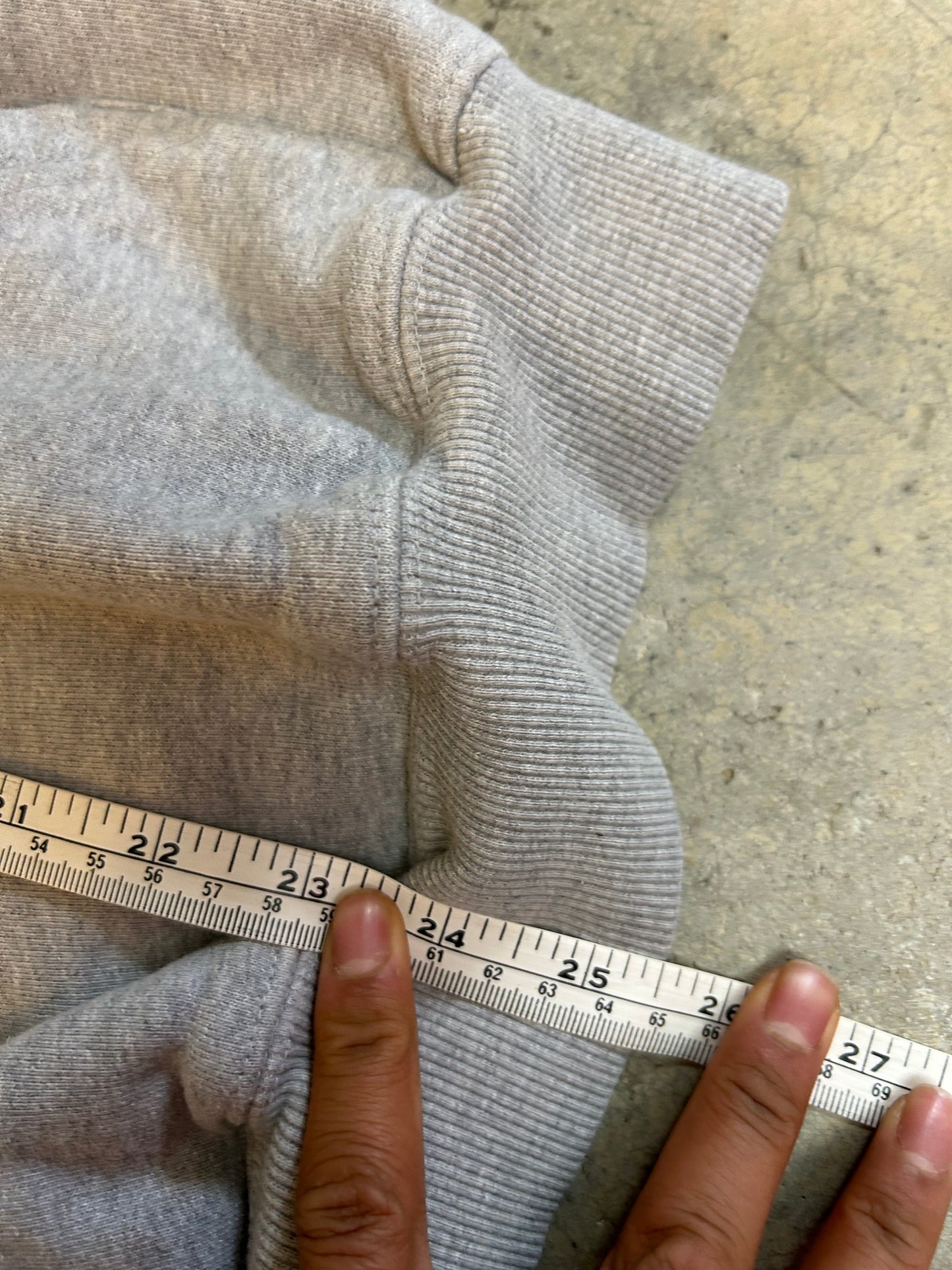 heather grey hoodie from Lower features a central "Lower" graphic of a hand on a vinyl record with star accents Medium