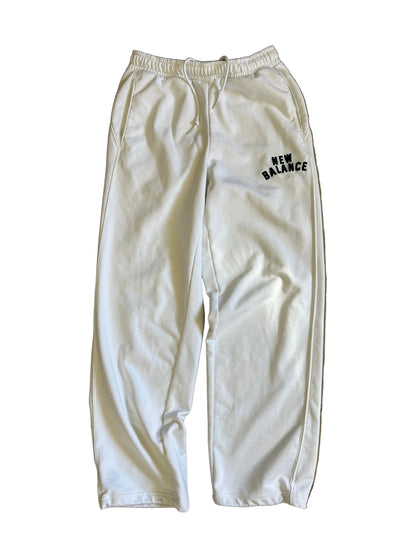 New Balance Essentials Varsity Fleece Sweatpants in a white colorway Medium