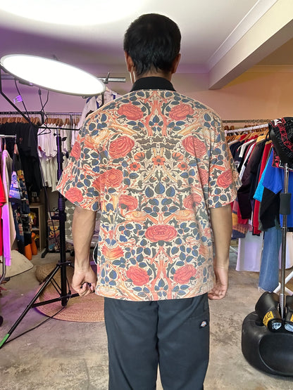 F*cking Awesome Warm Up Top featuring an all-over floral print. Medium Orange