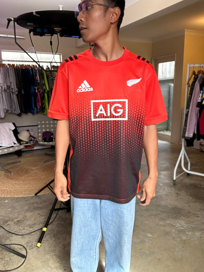 Orange Adidas New Zealand All Blacks Rugby Performance Training Jersey from approximately 2017 minimal Stains