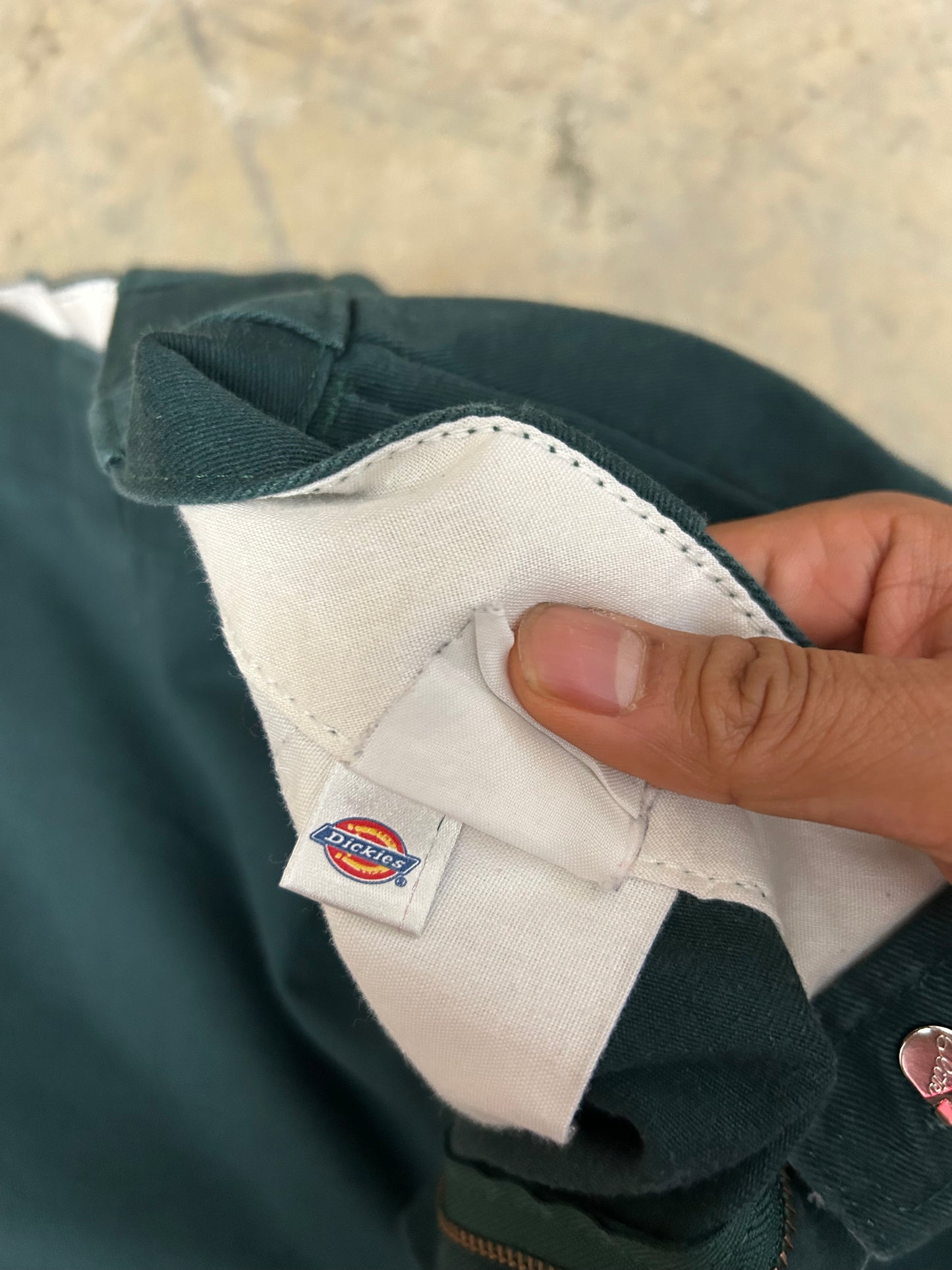 Vintage green Dickies 874 Original Fit Work Pants, recognized by their iconic tunnel belt loops and straight-leg cut 34