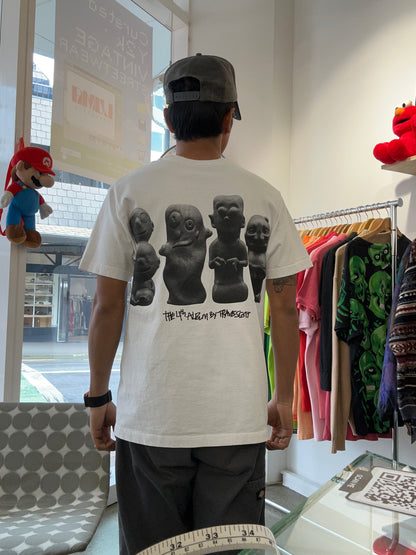 white Travis Scott Utopia B1 Tee featuring a colorful abstract graphic and the word "utopia" on the chest Medium