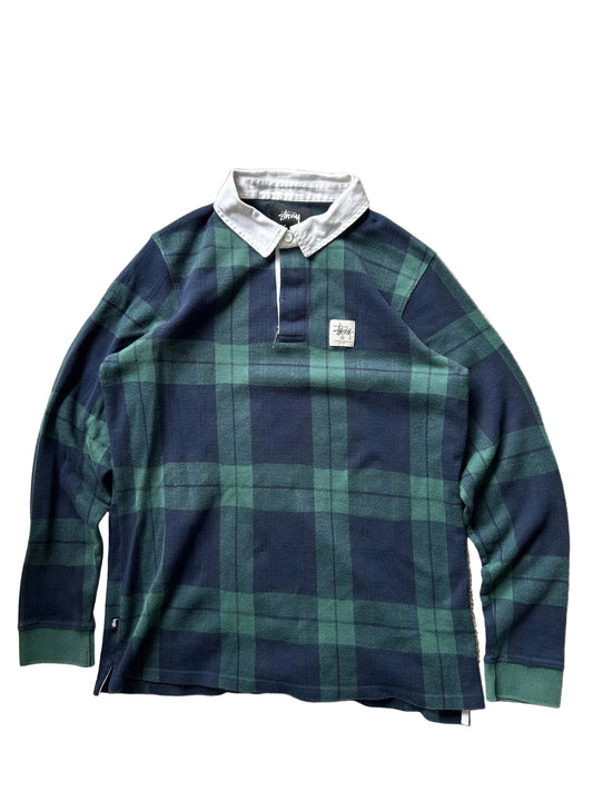 green and navy plaid shirt is the Stussy June Jacquard Rugby Shirt XL