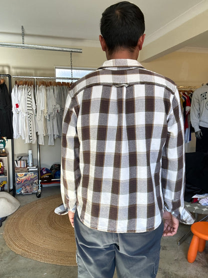 Levi's men's black and white plaid flannel long-sleeve button-up shirt, styled as a worker overshirt Medium Brown