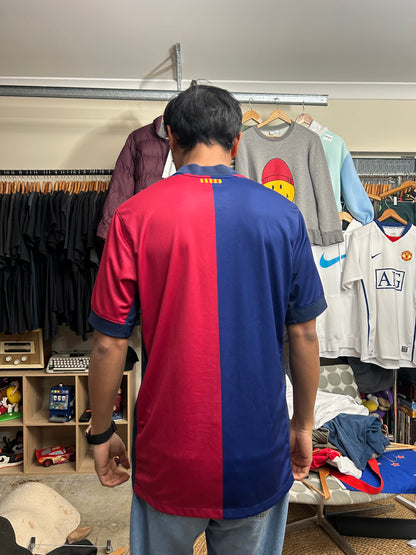 Nike FC Barcelona 2024/25 Home Jersey features a distinct split red and blue design with a gold Nike Swoosh