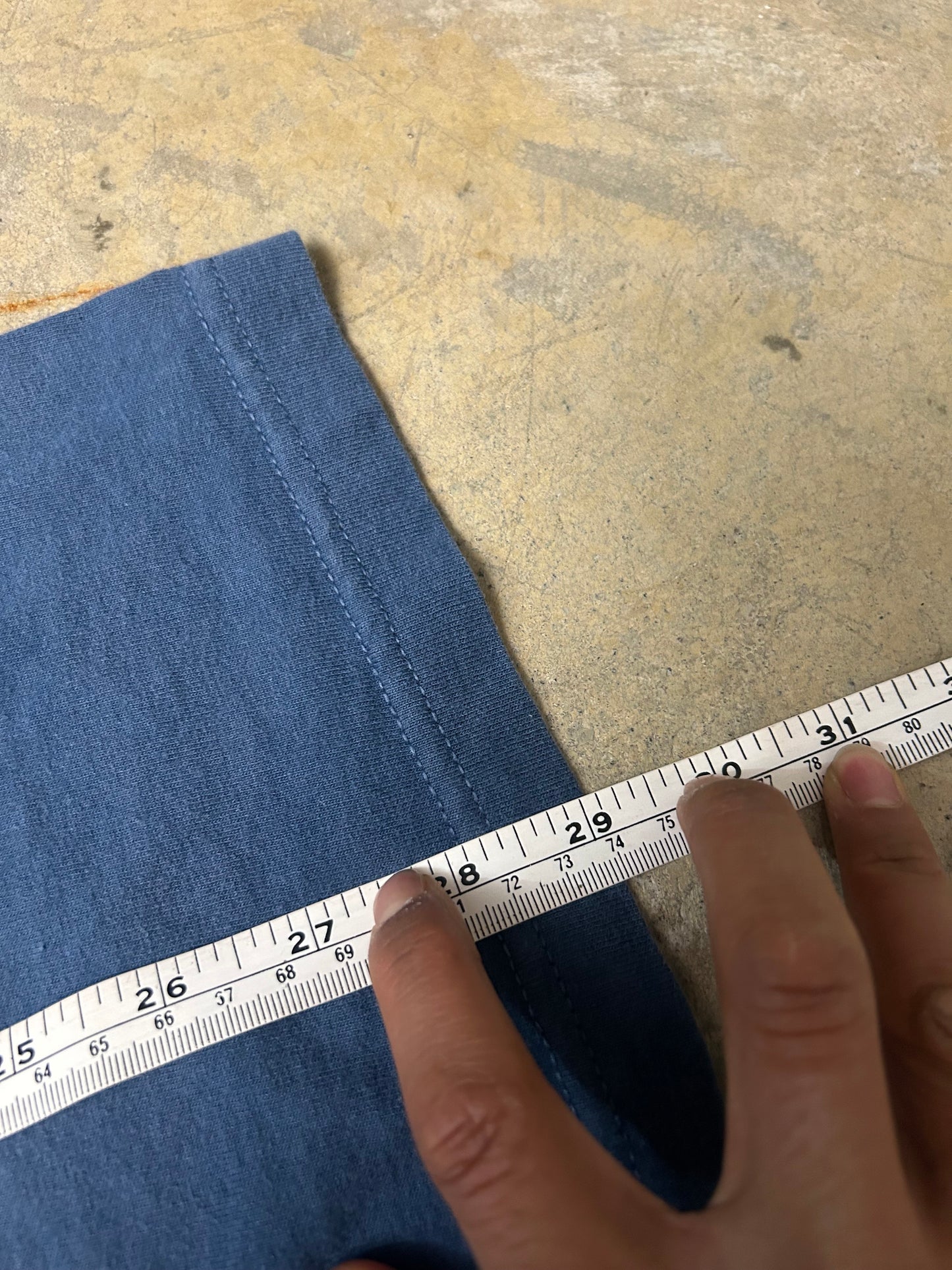 Vintage blue Swanndri t-shirt features a "Head Office" graphic print on the back Large