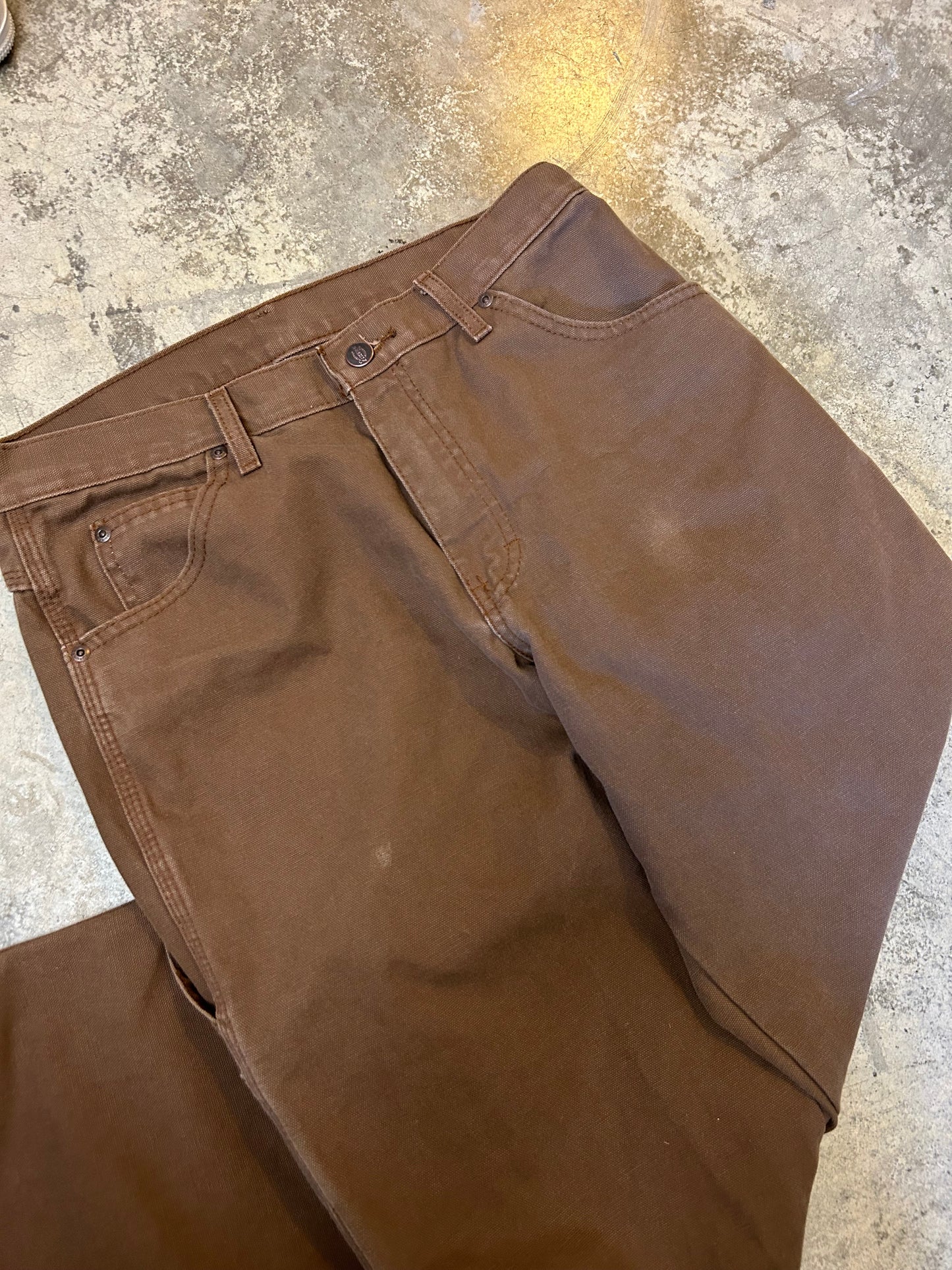 Vintage brown Dickies Relaxed Fit Duck Carpenter Jeans featuring a hammer loop and dual tool pockets
