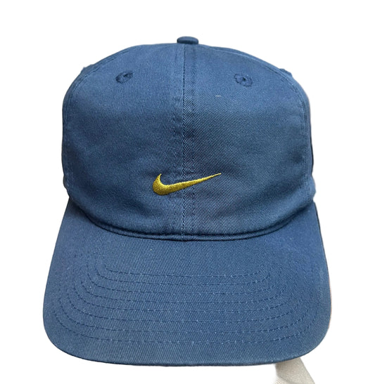 Vintage blue Nike cap featuring an embroidered gold swoosh logo Osfa