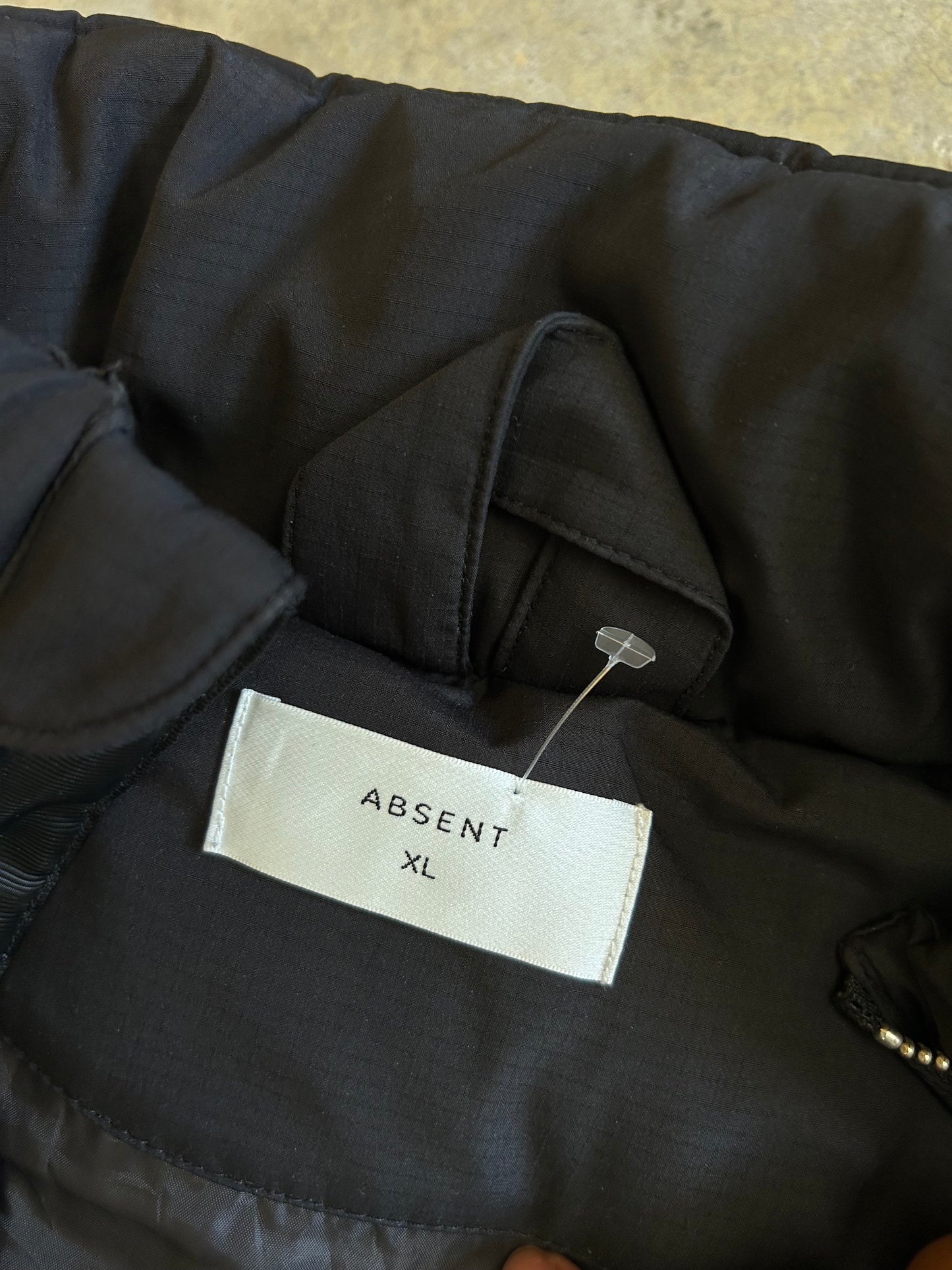 black puffer gilet resembles the Men's Regular Fit Water-repellent puffer vest from Absent XL