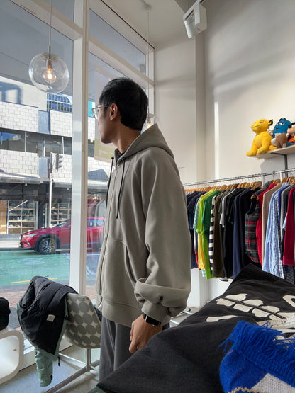 Heavy weight gray zip-up hoodie is likely an oversized Medium