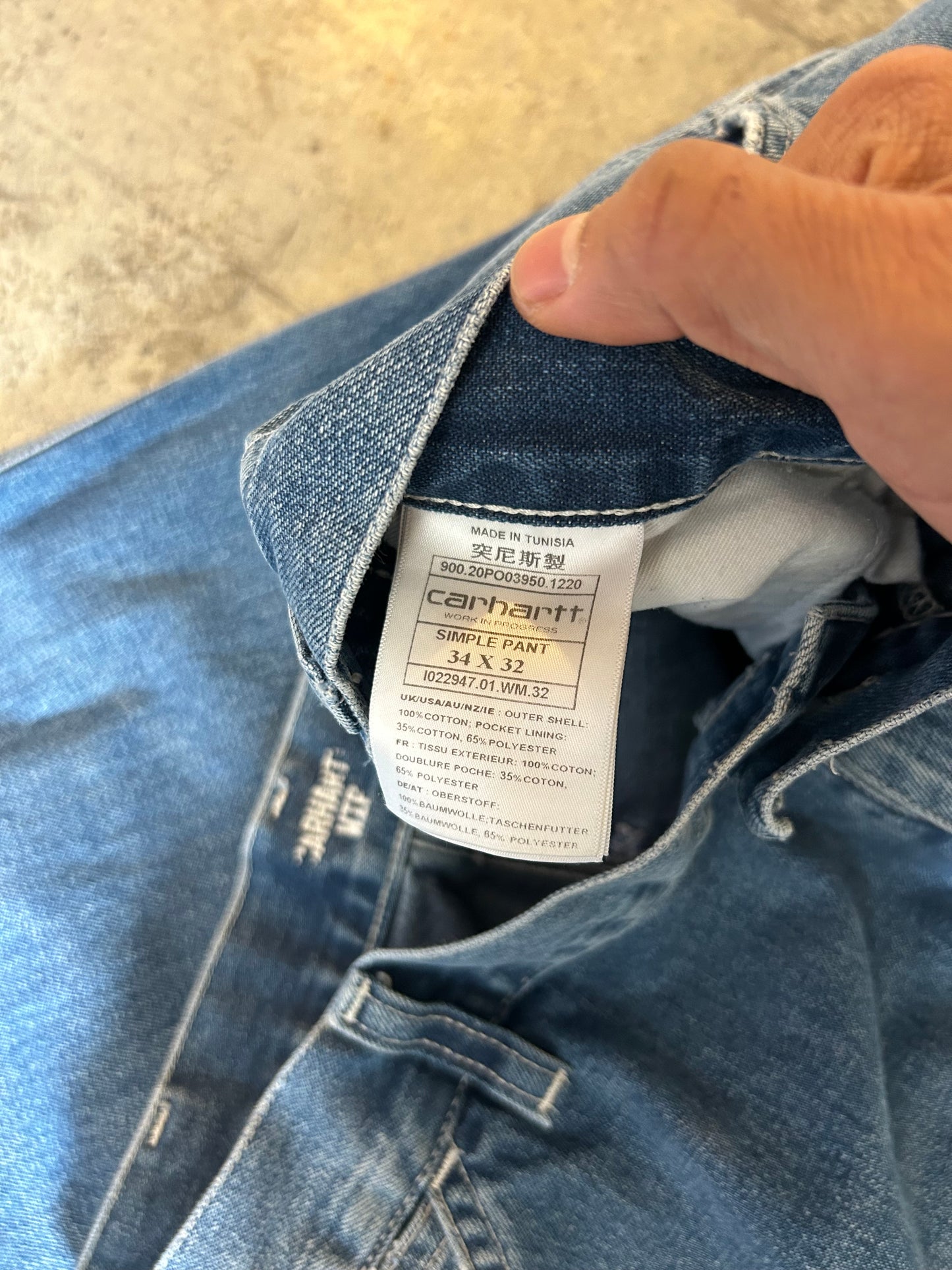 Carhartt WIP Simple Pants are rendered in a light blue stone-washed denim featuring the iconic square logo patch on the back pocket.Size 34