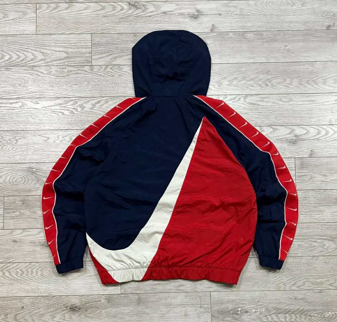 red and navy nike windbreaker