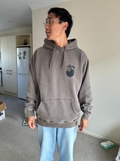 Stüssy 8 Ball Pigment Dyed Hoodie in a brown/taupe color, made from heavy cotton fleece