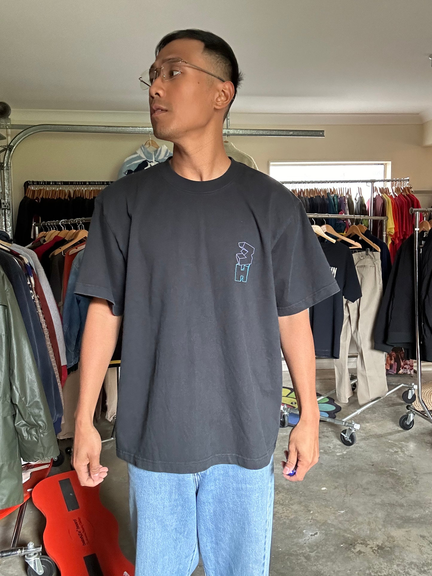 Wassup House, as indicated by the distinct "WH" logo on the chest Large Black