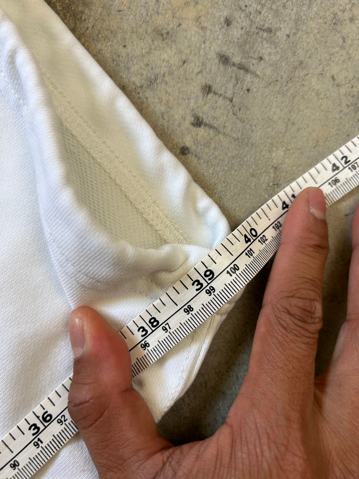 New Balance Essentials Varsity Fleece Sweatpants in a white colorway Medium