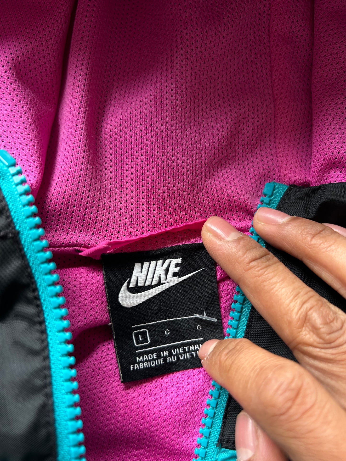 Nike Sportswear Windrunner Jacket in a black, teal, and purple colorway Large