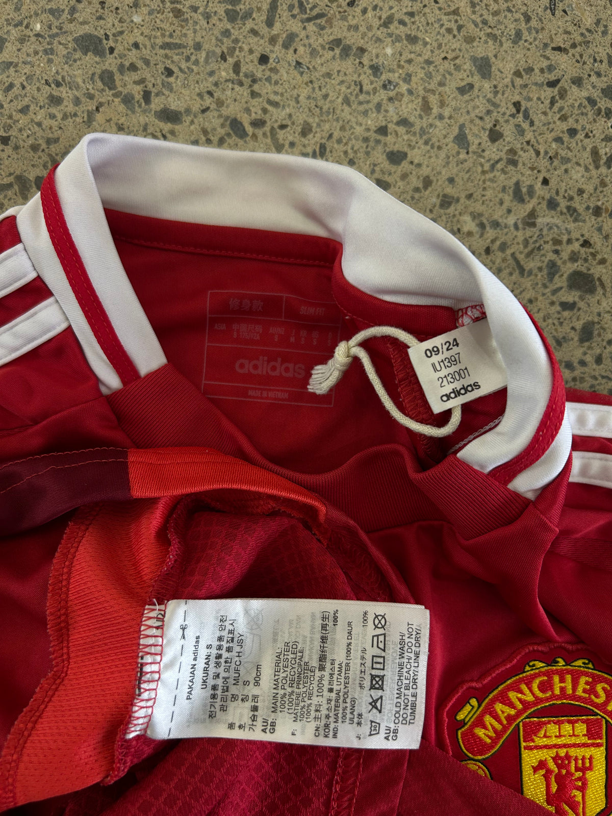 adidas Manchester United 2024/25 Home Jersey in red featuring the Snapdragon sponsor logo Small