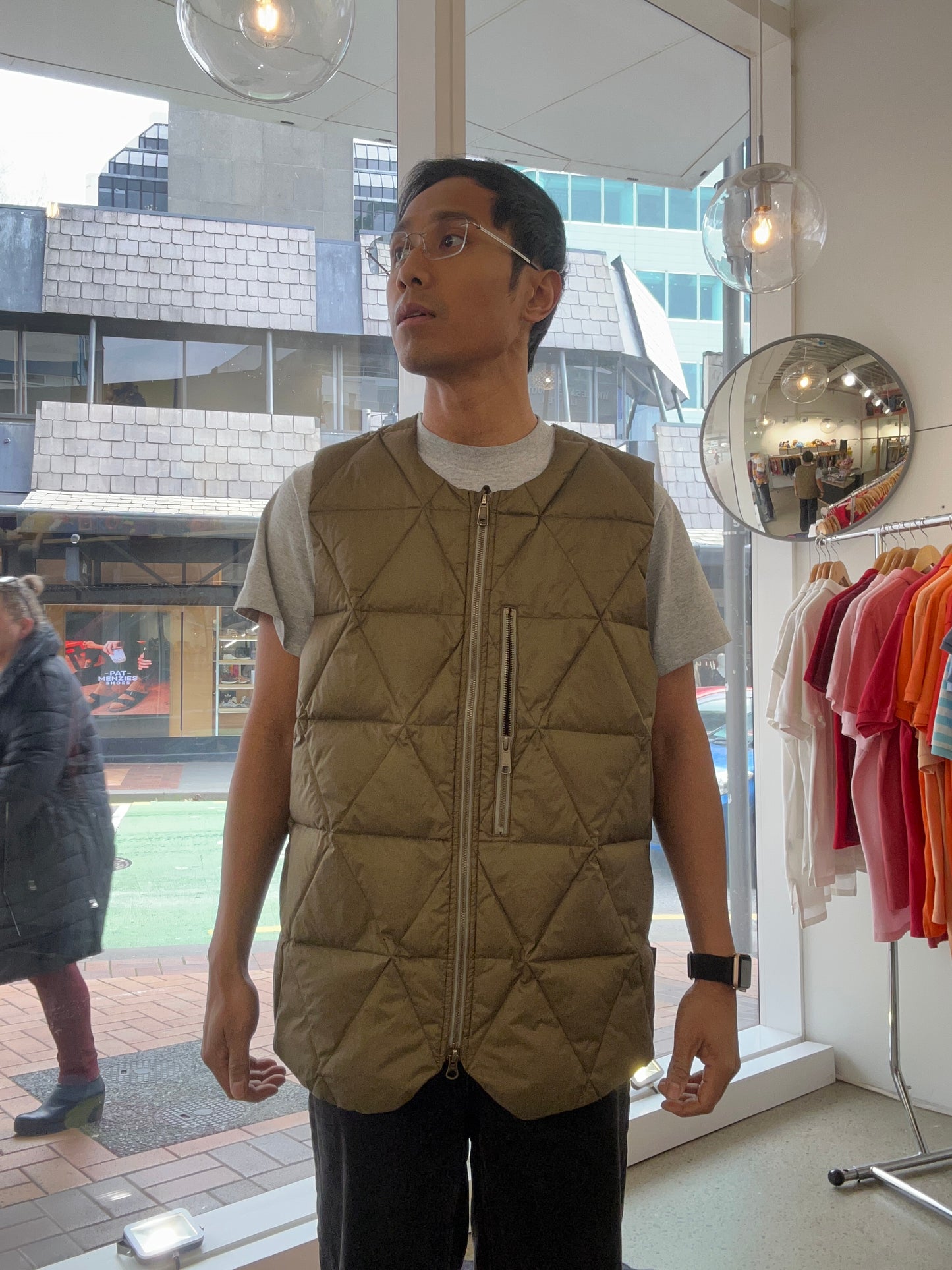 Holden Pyramid Down Vest in a brown olive color, featuring a unique triangular quilted pattern. Large