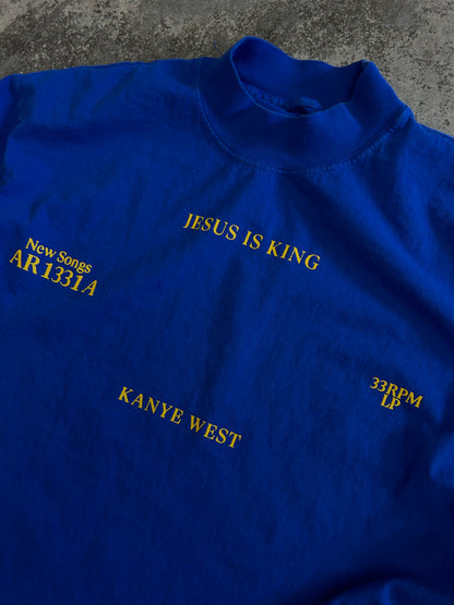 royal blue Kanye West "Jesus Is King" vinyl merchandise t-shirt featuring yellow puff print text Medium