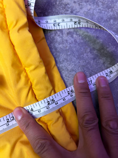 Medium vintage yellow Columbia Sportswear jacket with a blue stripe design across the chest. Has Stains