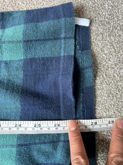 green and navy plaid shirt is the Stussy June Jacquard Rugby Shirt XL