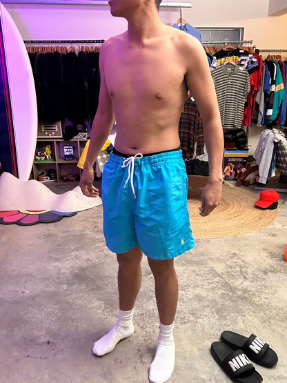 Ralph Lauren swim trunks featuring a blue body with a yellow pony logo Shorts Large