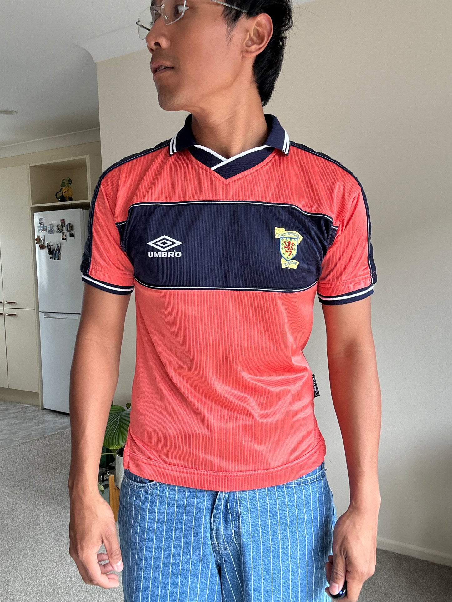1999-00 Scotland Umbro away football shirt, featuring a distinct coral red body with navy blue accents XS Youth 10-12