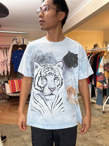 Vintage 2003 light blue tie-dye The Mountain T-shirt features a bold graphic of a white tiger, a black panther, and a tiger Large