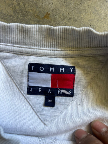 vintage-style Tommy Jeans crewneck sweatshirt features a prominent vertical logo patch on the chest Large