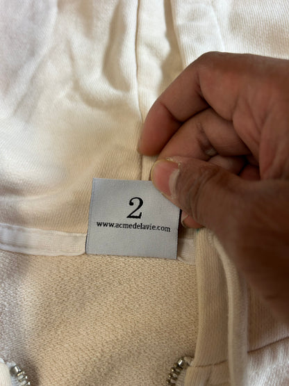 cream-colored zip-up hoodie  "Acmé de la Vie" (ADLV)
