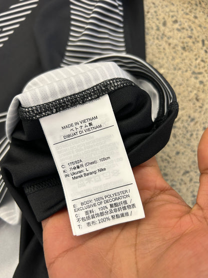 Nike Sportswear Tuned Air Men's Football Shirt featuring a distinct black and white vein stripe pattern Large