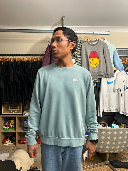 green Nike Men's Sportswear Club Fleece Crew features a classic embroidered logo on the chest Large