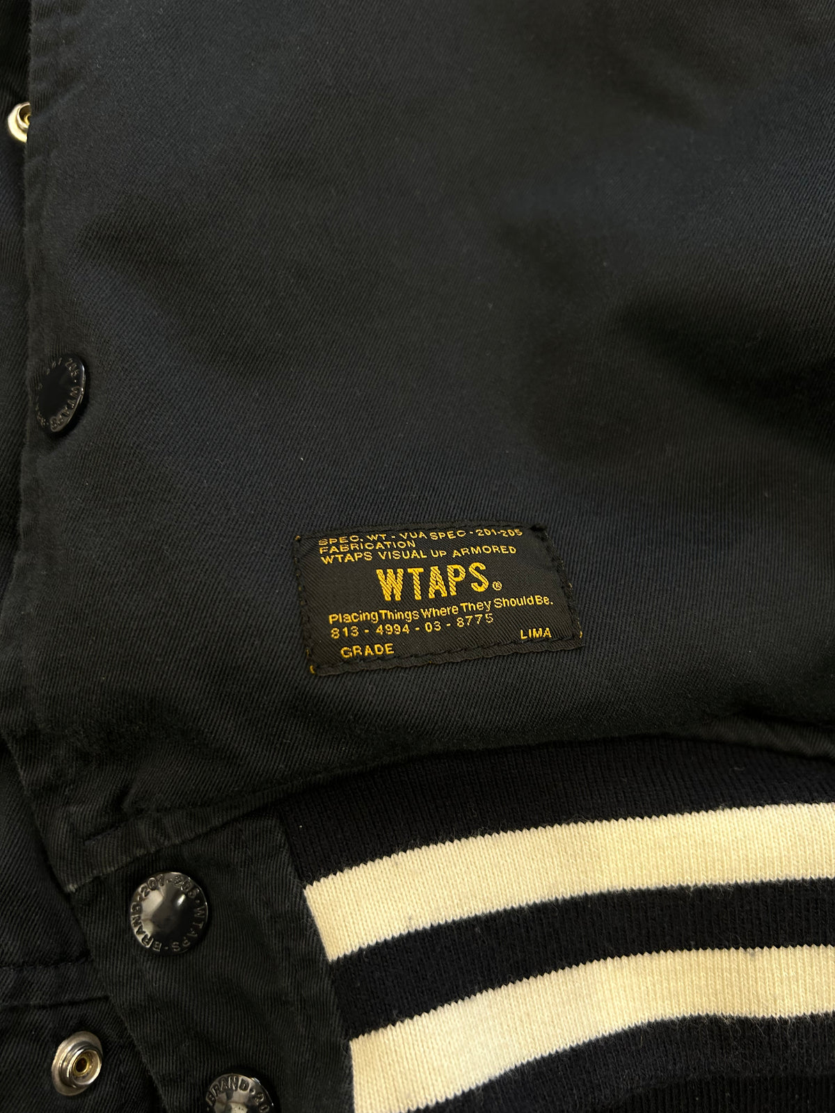 WTAPS 15SS Team Reversible Jacket (often called the Team JKT), featuring a Detroit Tigers-style "D" logo on the chest and a reversible floral/hibiscus lining Large