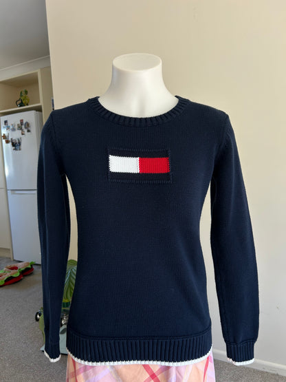 navy blue Tommy Hilfiger crew-neck cotton knit sweater with the iconic red and white flag logo on the chest Small Women's