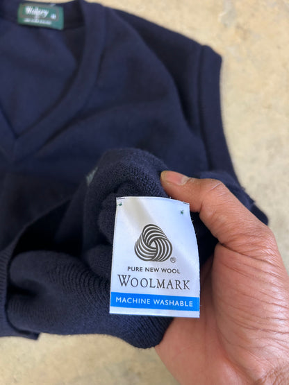 navy blue knitted v-neck vest is a vintage Wolsey brand garment made in New Zealand Medium