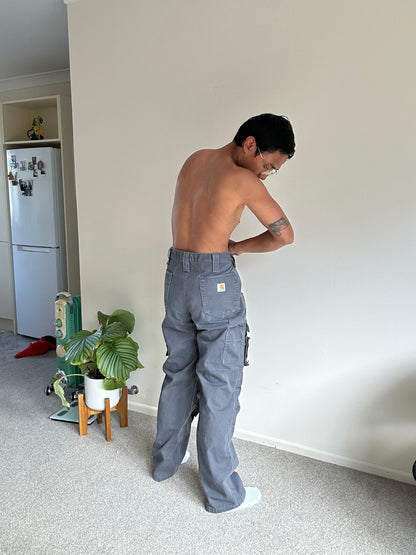 Carhartt Men's Multi Pocket Washed Duck Pants, designed for heavy-duty work with multiple storage pockets and reinforced knees.  Grey 36 waist