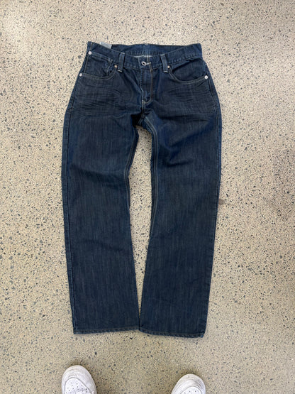 Levi's 514 Slim Straight Jeans featuring unique back flap pockets and a twisted seam design size 32