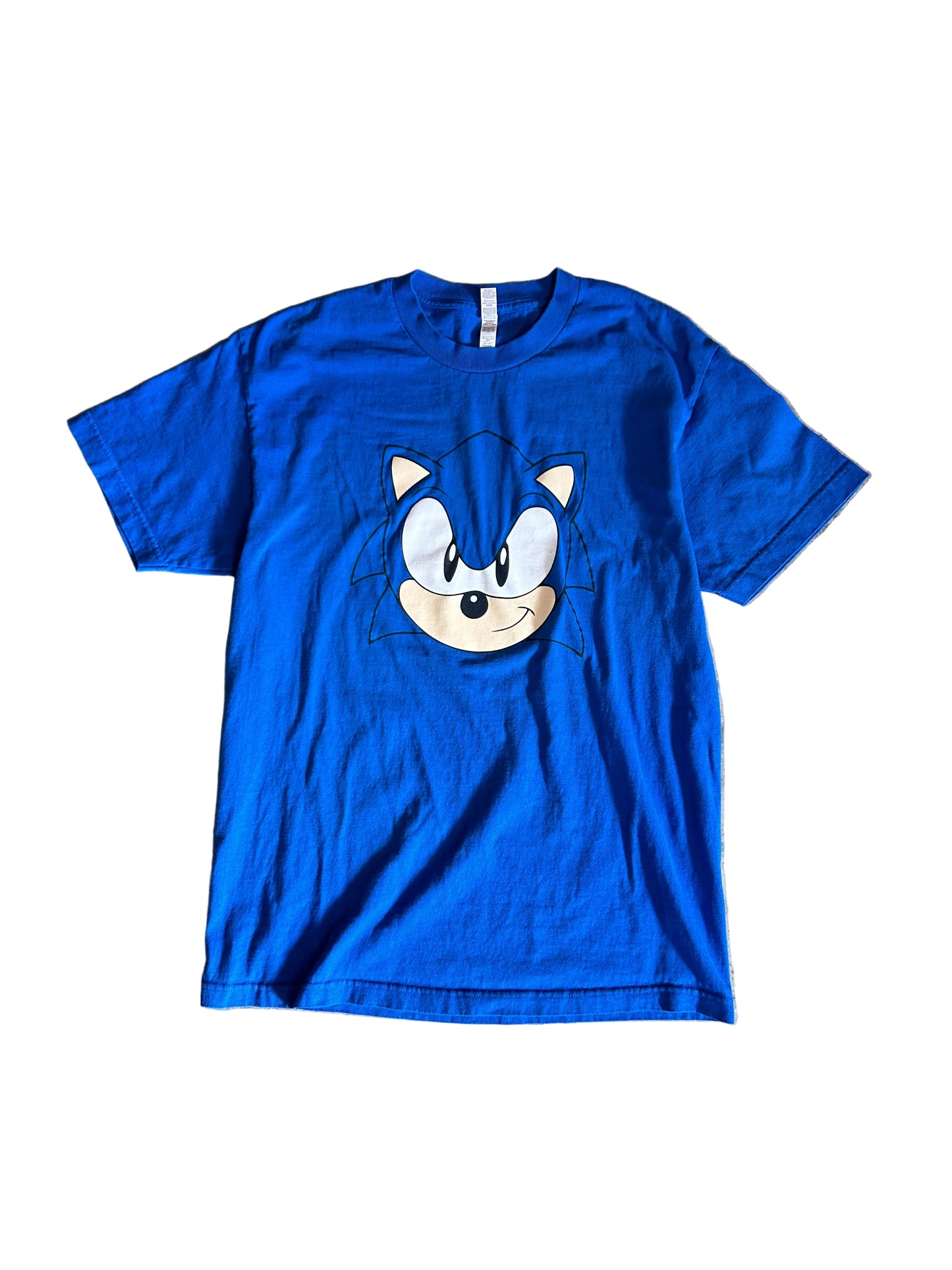 Large blue Sonic the Hedgehog t-shirt features a large graphic of Sonic's face on the front
