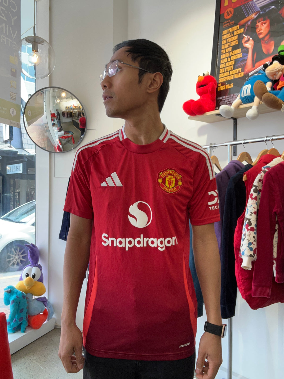 adidas Manchester United 2024/25 Home Jersey in red featuring the Snapdragon sponsor logo Small