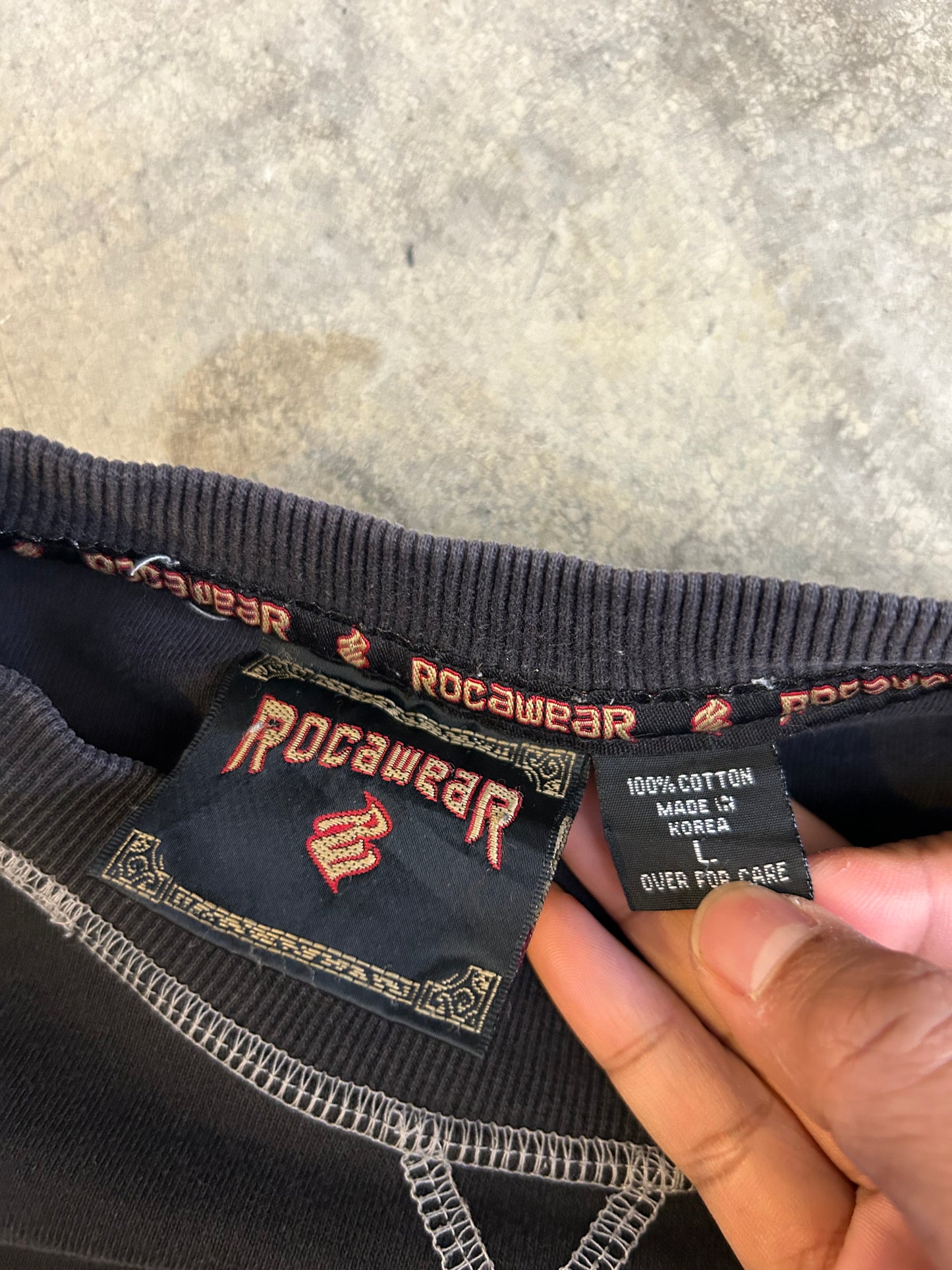 vintage black Rocawear crewneck sweatshirt featuring white contrast stitching Large