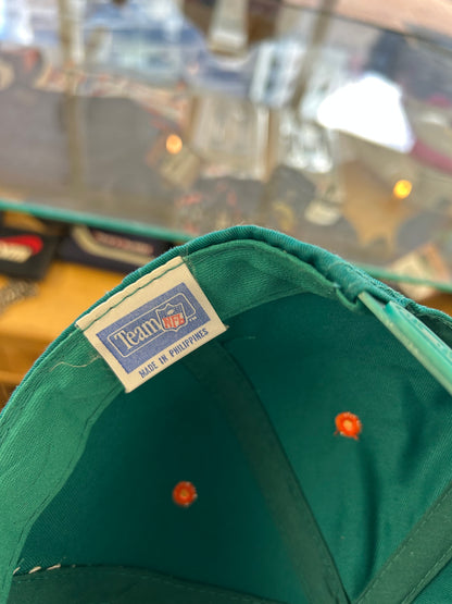 vintage Miami Dolphins snapback hat features a distinctive orange brim contrasting with a teal crown