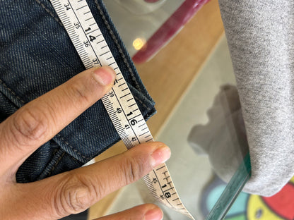 Levi's 514 Slim Straight Jeans featuring unique back flap pockets and a twisted seam design size 32