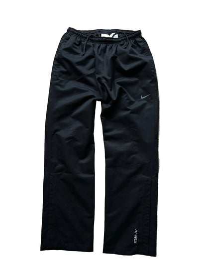 pair of black Nike Storm-FIT men's golf pants Size Large 32-34
