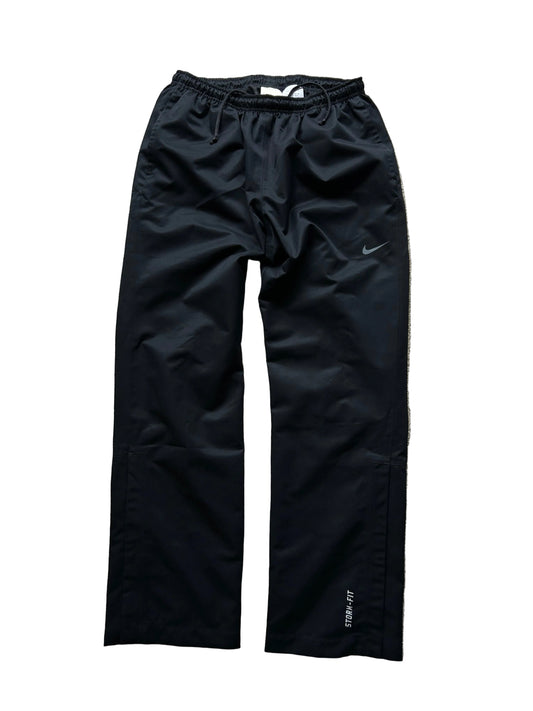 pair of black Nike Storm-FIT men's golf pants Size Large 32-34