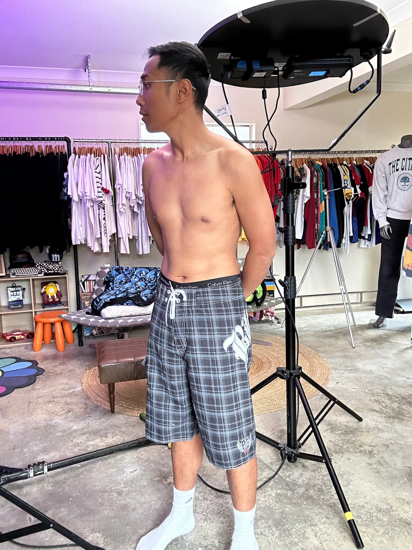 2000s Billabong black and grey plaid board shorts featuring a large embroidered logo on the back 32