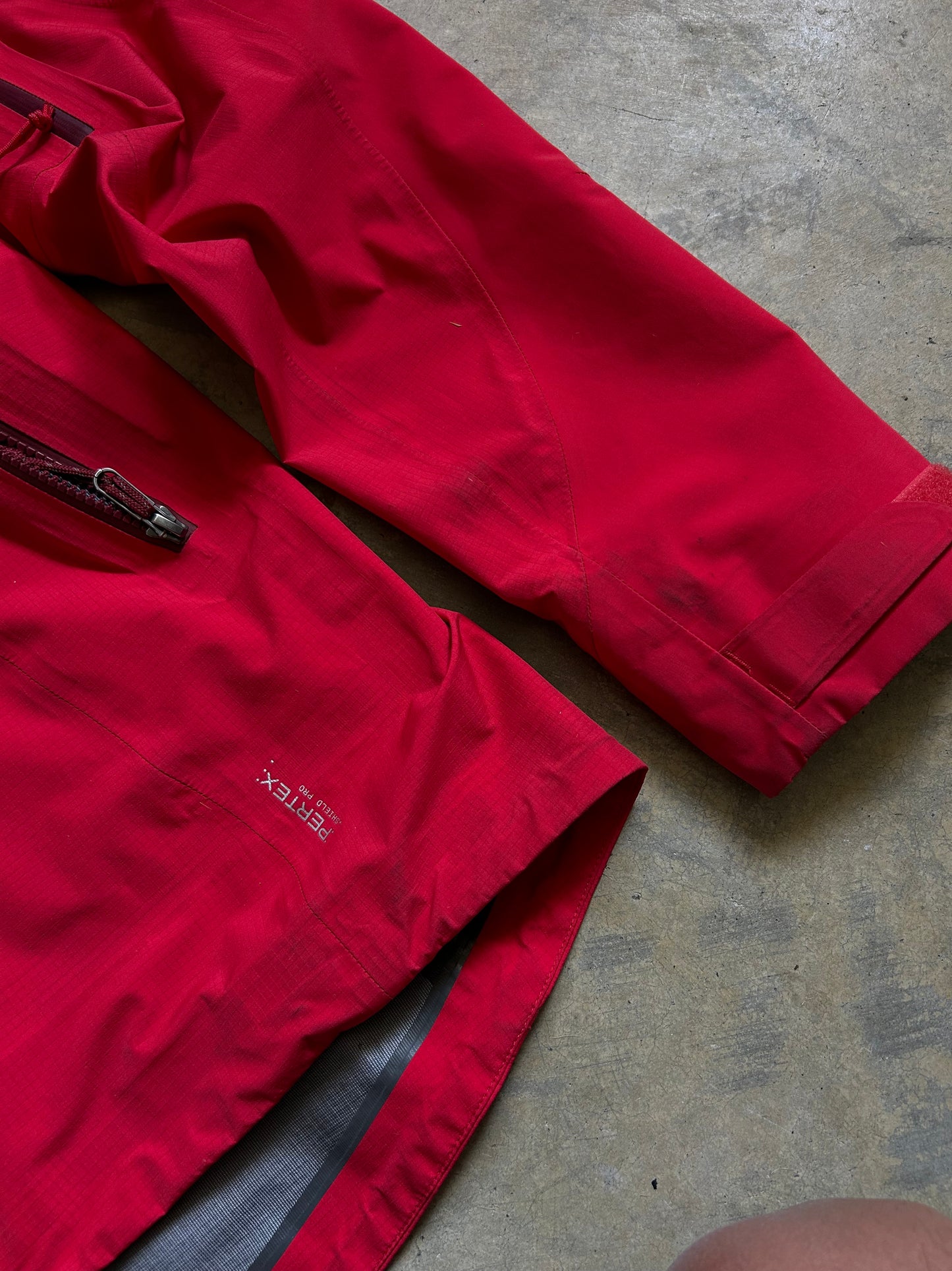 Macpac Lightweight Prophet Rain Jacket, a technical alpine hardshell designed for extreme conditions above the snowline Alpine Series Medium Red