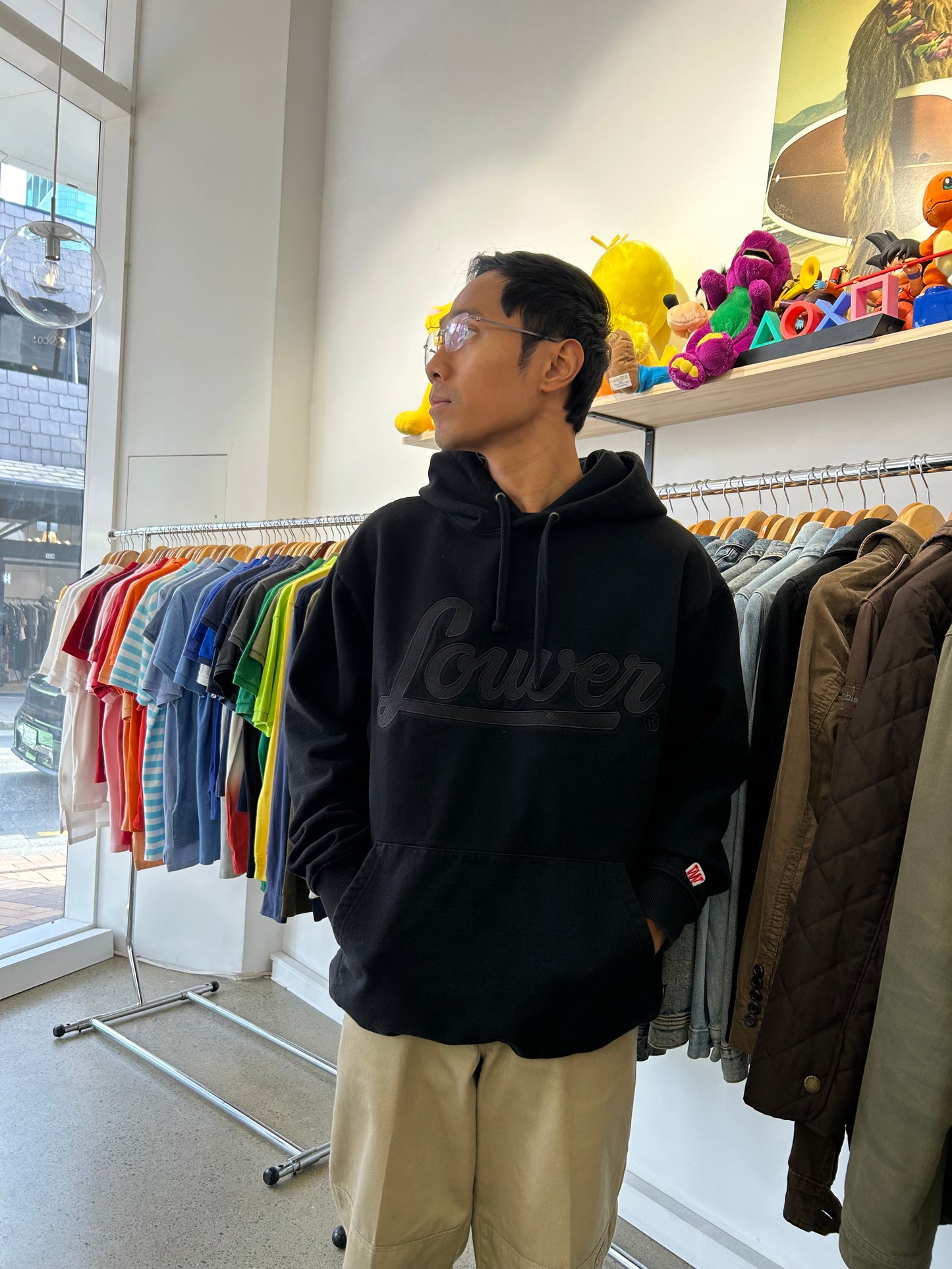 black Lower Billie hoodie featuring a tonal cursive logo on the chest.Large
